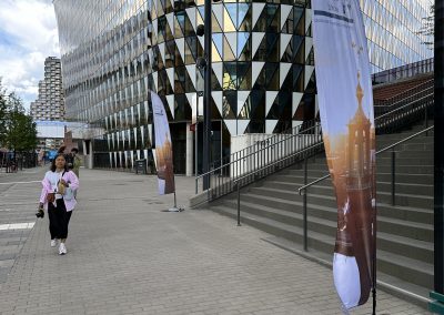 Maria Yohuang in front of Aula Medica, walking on Solnavägen.